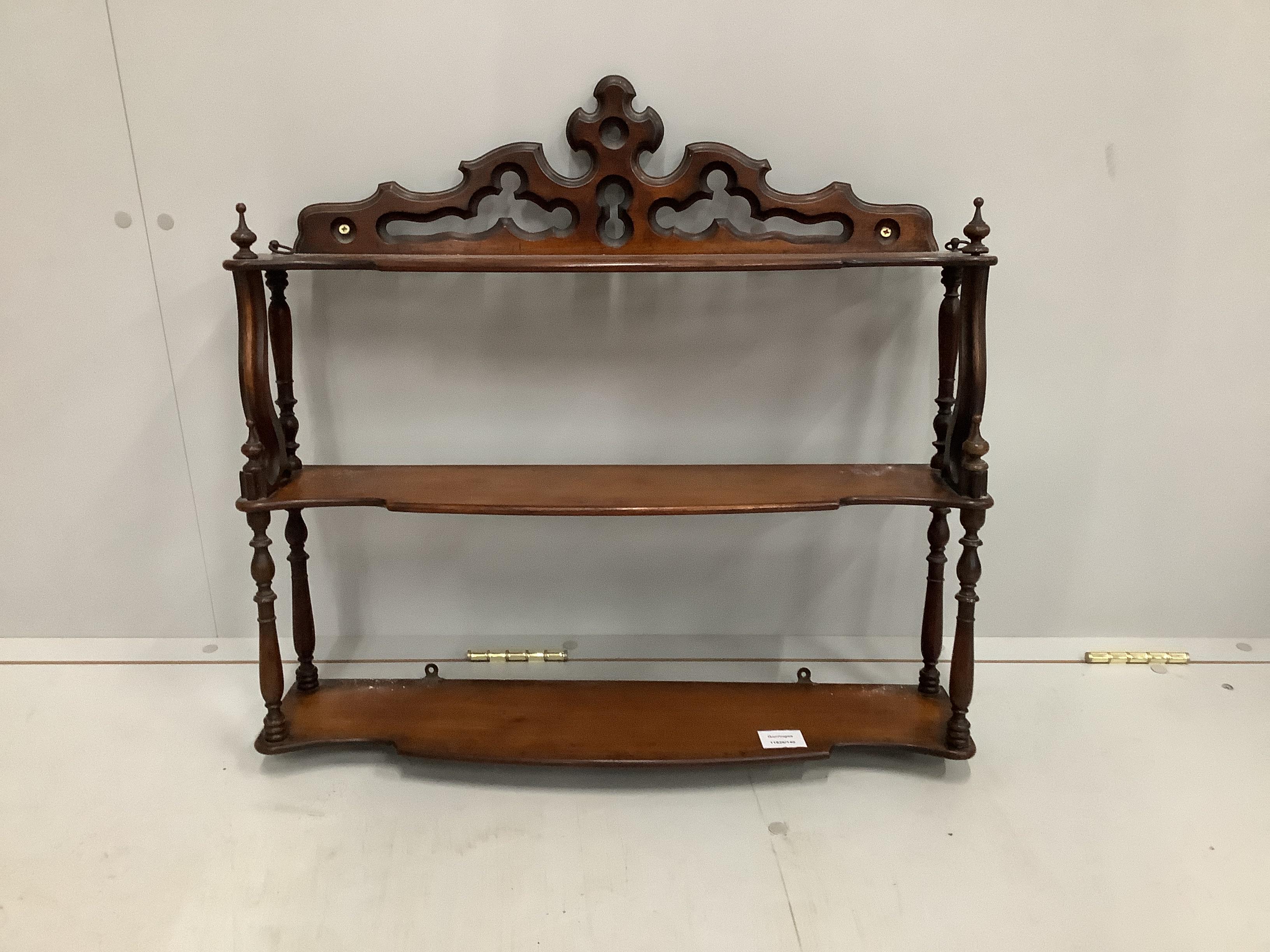 A Victorian three-tier mahogany wall bracket, width 66cm, depth 16cm, height 62cm